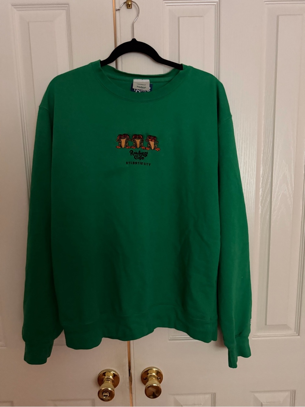 Rainforest Cafe - Green Embroidered Crewneck Sweatshirt.  Summer price is $15.